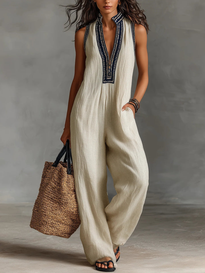 Emma | Tuta beige smanicata con scollo profondo e gamba larga
