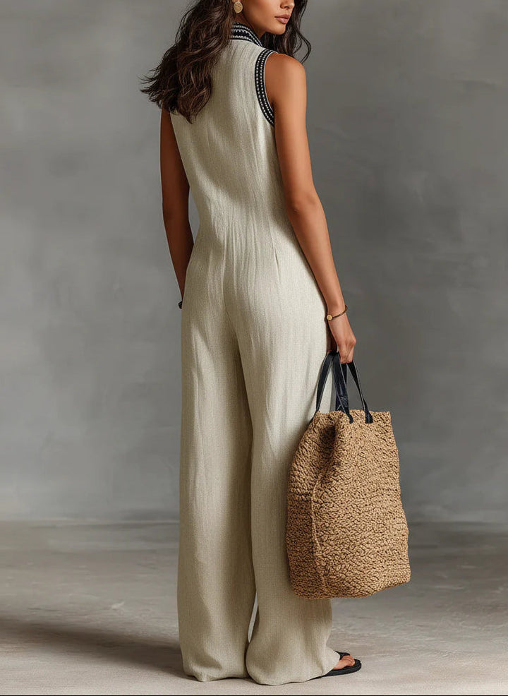 Emma | Tuta beige smanicata con scollo profondo e gamba larga
