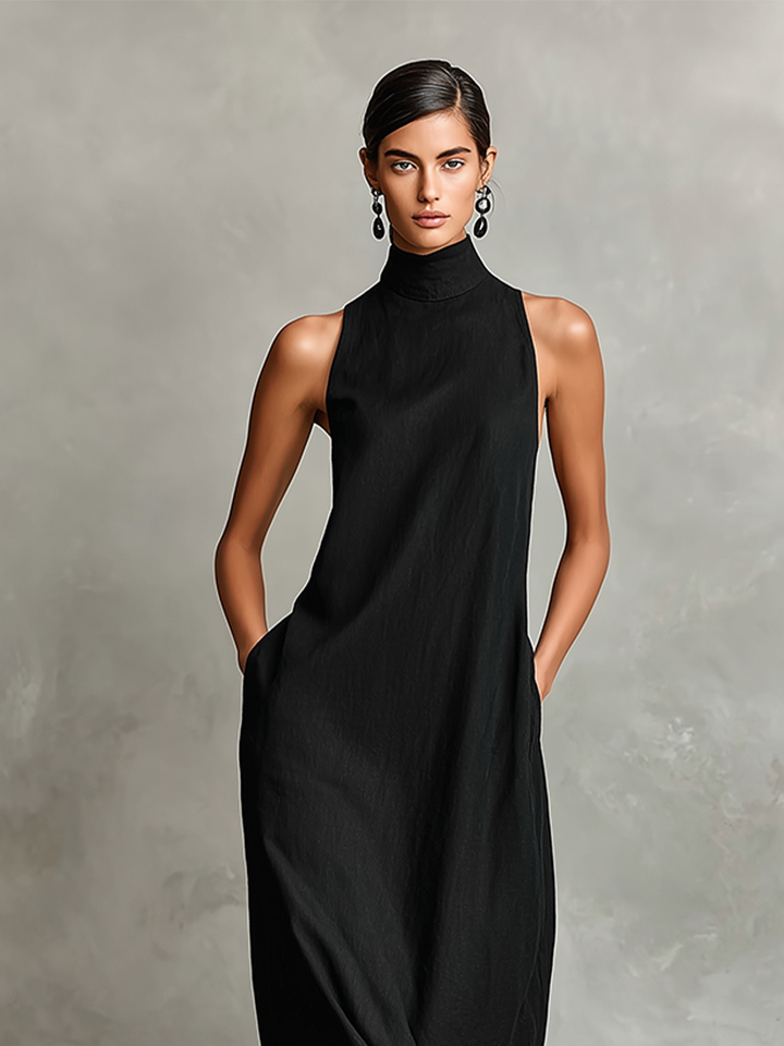 Sara | Maxi abito nero smanicato con collo alto e tasche laterali