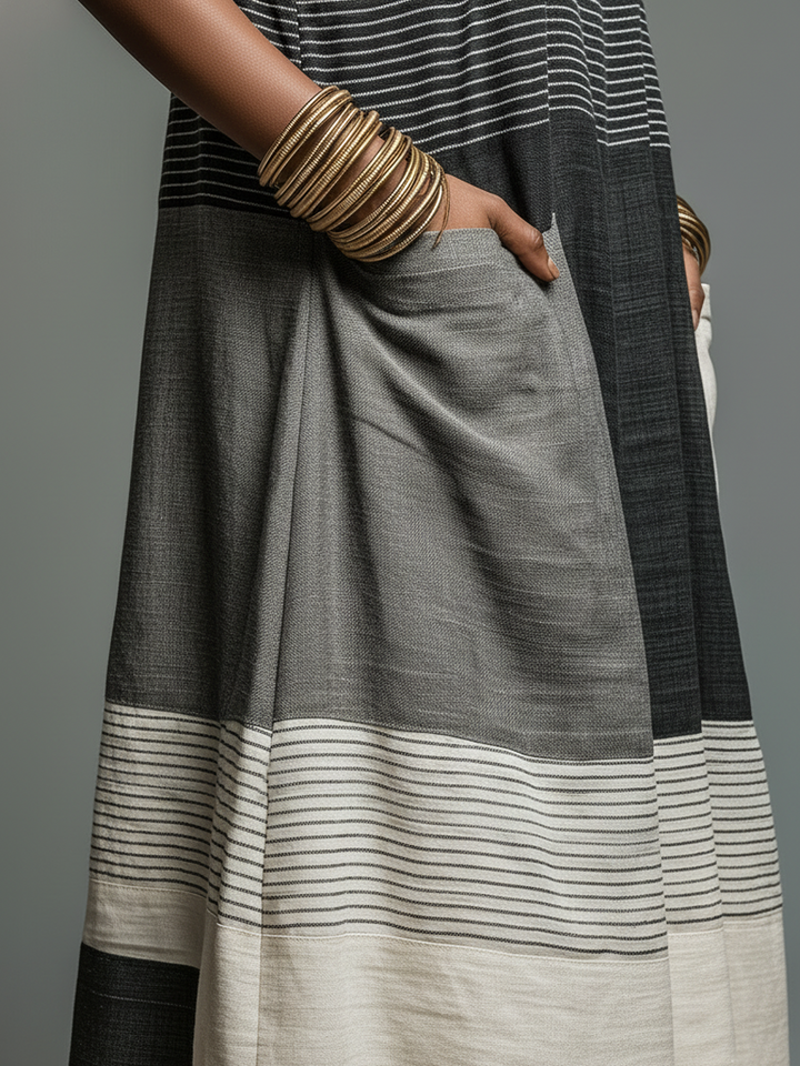 Armonia | Abito maxi a righe con blocchi di colore