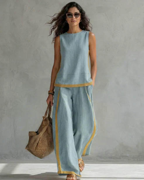 Nicole | Completo due pezzi top senza maniche e pantaloni a gamba larga con profili cuoio