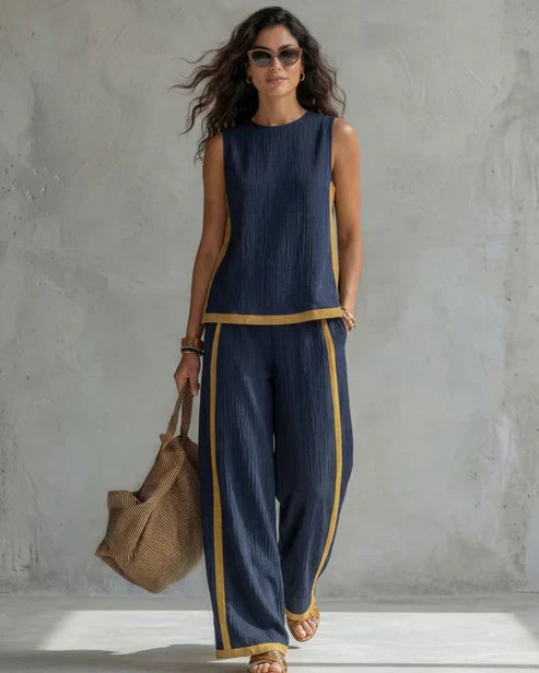 Nicole | Completo due pezzi top senza maniche e pantaloni a gamba larga con profili cuoio