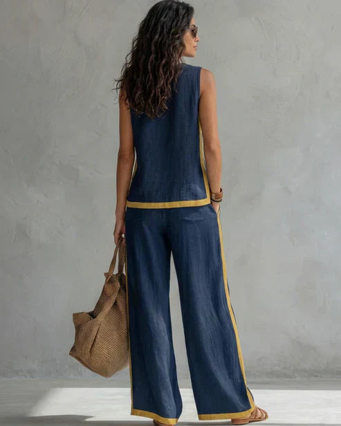Nicole | Completo due pezzi top senza maniche e pantaloni a gamba larga con profili cuoio