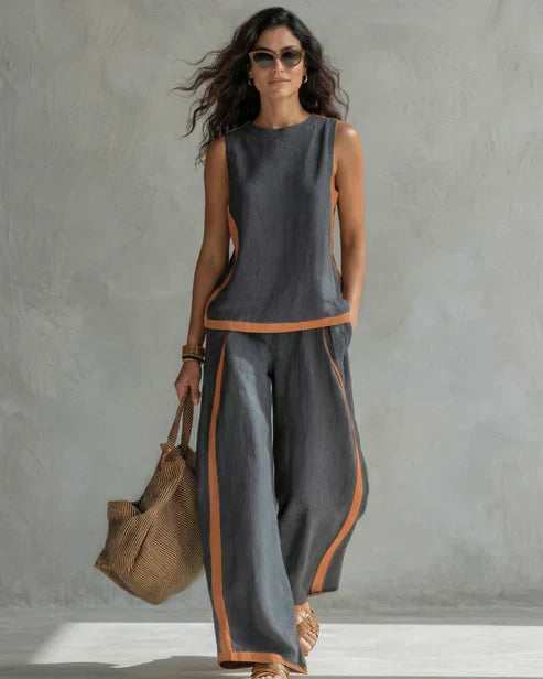 Nicole | Completo due pezzi top senza maniche e pantaloni a gamba larga con profili cuoio