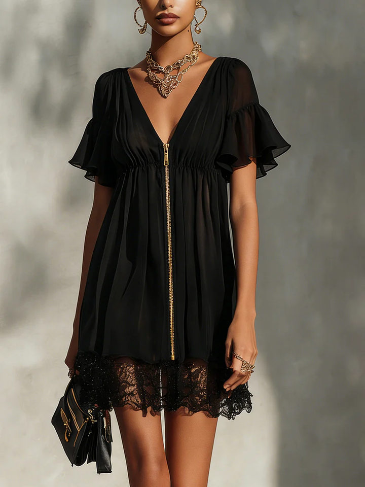 Modena | Miniabito nero in chiffon con cremallera dorata e orlo in pizzo