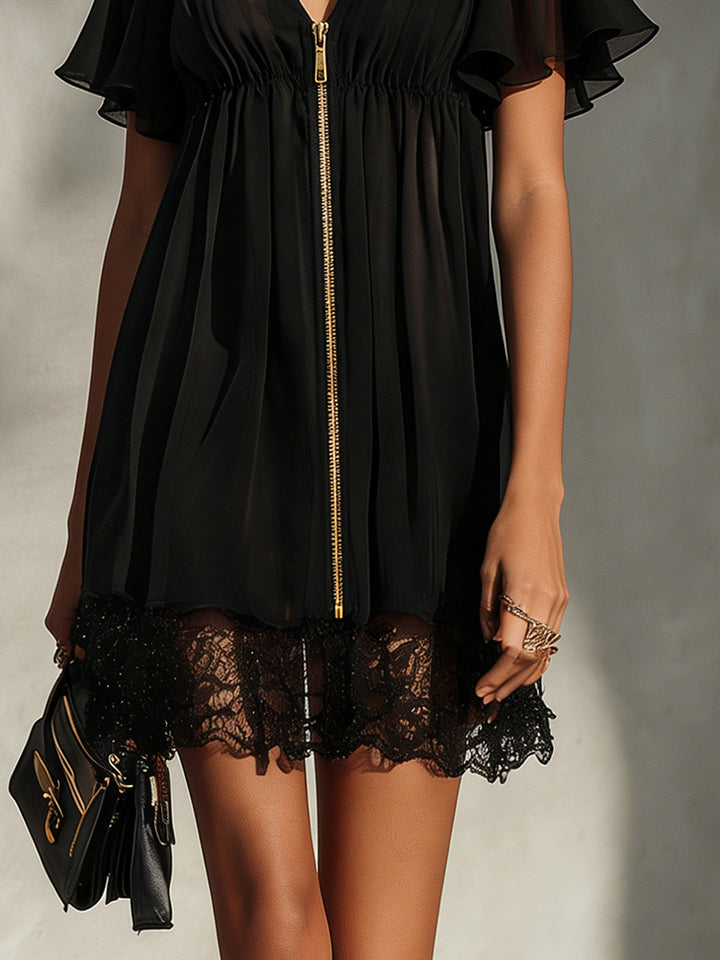 Modena | Miniabito nero in chiffon con cremallera dorata e orlo in pizzo