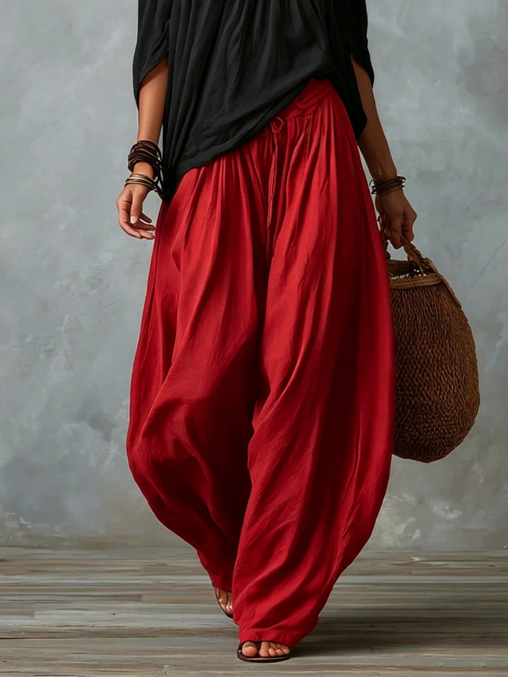 Lipari | Completo due pezzi con top nero off-shoulder e pantaloni lanterna rossi