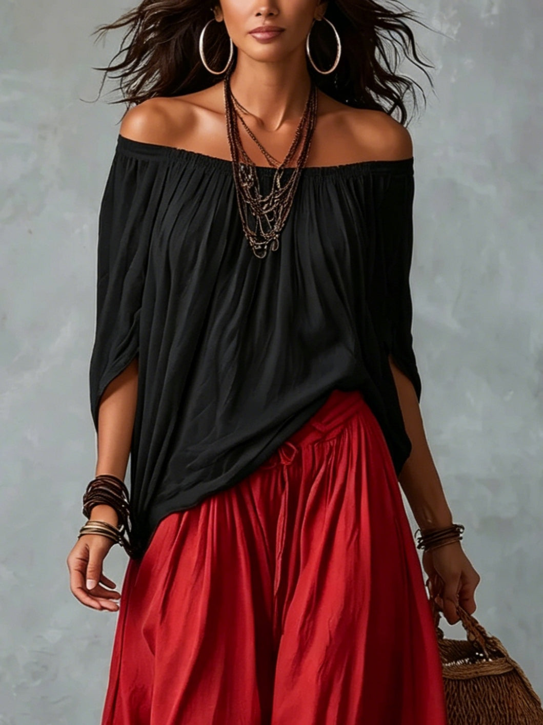 Lipari | Completo due pezzi con top nero off-shoulder e pantaloni lanterna rossi