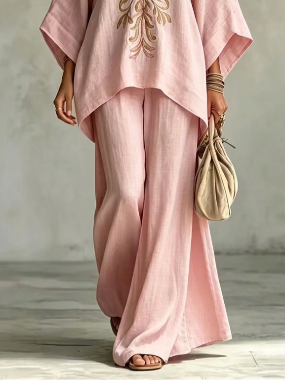 Abruzzo | Completo rosa con top a mantella ricamato e pantaloni ampi