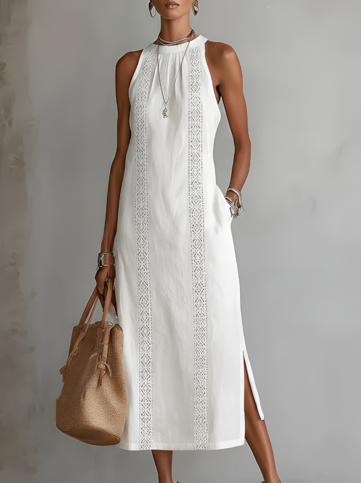 Splendida | Abito midi smanicato bianco con dettagli ricamati e tasche laterali